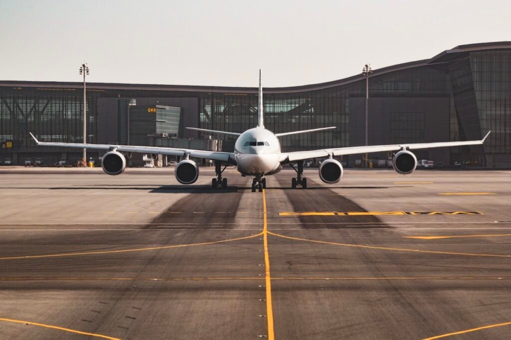 Grounded widebody aircraft parked at an airport gate during the WestJet strike